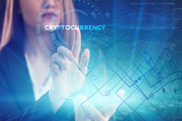 The concept of business, technology, the Internet and the network. A young entrepreneur working on a virtual screen of the future and sees the inscription: Cryptocurrency