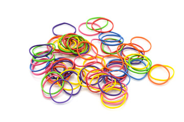 Pile of colorful rubber bands isolated on white background