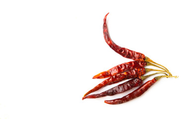 Dried chili peppers on white background