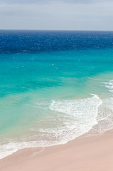 ocean landscape. blue and deep blue water of ocean and beach with surf wave