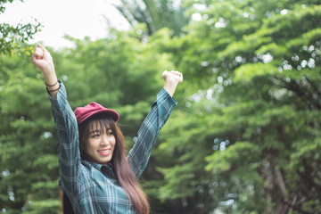 Portrait charming beautiful Asia woman at garden park nuture background.