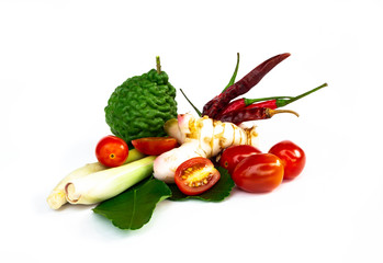 Ingredients Thai spicy soup (Tom-yum) include lemongrass, kaffir lime, tomato,chilli pepper,Galangal on white background