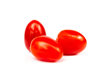 Cherry tomatoes stack isolated on white background