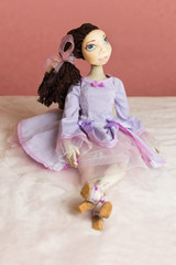 Interior doll. Exclusive doll. The doll is dressed in a chic handmade dress.