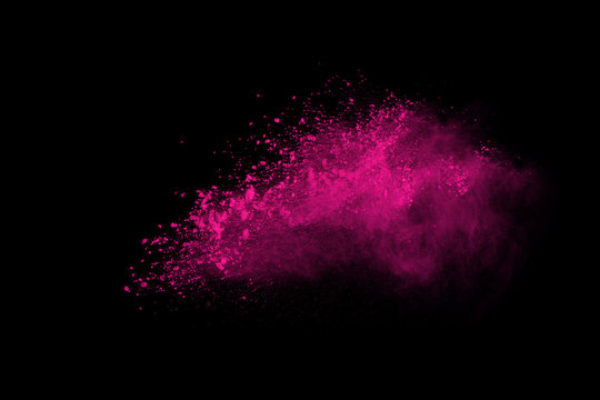 Abstract pink powder explosion on black background. abstract colored powder splatted, Freeze motion of pink powder exploding.