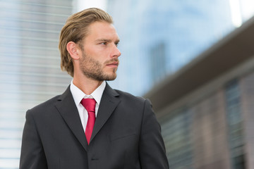Fototapeta premium Handsome businessman in a business environment