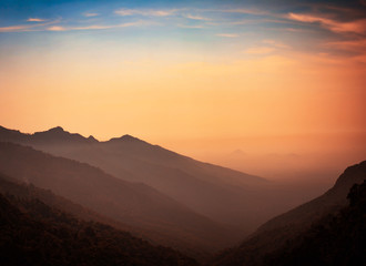 Obraz premium Majestic scene of silhouettes of mountains