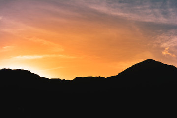 Majestic scene of silhouettes of mountains