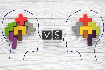 Heads of two people with colourful shapes of abstract brain for concept of idea and teamwork. Two people with different thinking. - obrazy, fototapety, plakaty