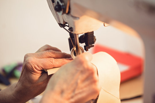 Shoemaker workshop for making shows artisan handmade manufacturing leather shoes. Shoe manufacture business for traditional vintage shoe making, craft boots in traditional style