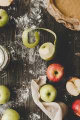 Cooking apple pie. Fresh apples for apple pie on the wooden table. Top view