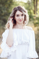 Naklejka premium Beautiful Young Woman Outdoors. Enjoy Nature Beauty Girl Outdoor a Freedom nature concept