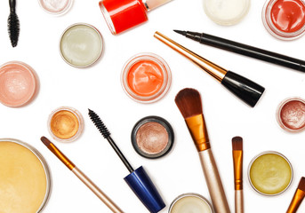 Top view of decorative cosmetics and brushes collection