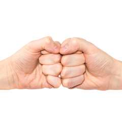 Two hands with fists bumping isolated on white background