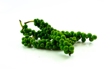 Fresh green pepper.(Piper nigrum Linn) Piperaceae or Peppercorns isolated on white background