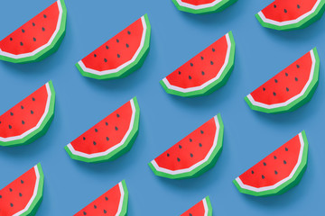 Watermelons made of paper pattern on blue pastel background.