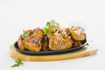 chicken wings with sesame on white background