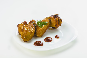chicken wings with sesame on white background