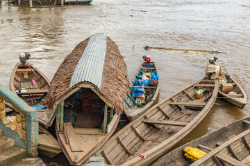 Long Wooden Boats at the Dock in the Market Town of Mazan, Peru