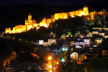 Fototapeta na wymiar Tbilisi old town and Narikala fortress at night, Georgia