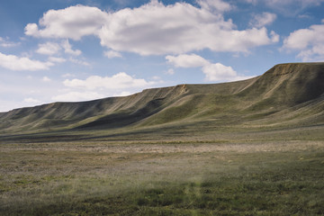 Big clouds and blue sky over the hills of Central California