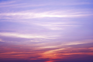 Naklejka na ściany i meble Beautiful pastel cloudy sunset with blue sky in India