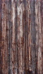 A fence of vertical dark turquoise boards. Blank background with a texture of wooden slats 
