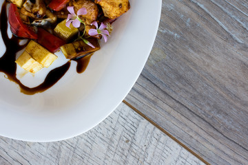 Chinese specialty with chicken and vegetables in soy sauce