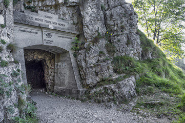 Naklejka premium the first tunnel on the Road of 52 galleries, Veneto, Italy / Strada delle 52 gallerie (Road of 52 galleries) is a military trail built during World War I on the massif of Pasubio (Vicenza, Italy)