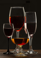 Glass still life image A glass of red wine in a glass on a black background