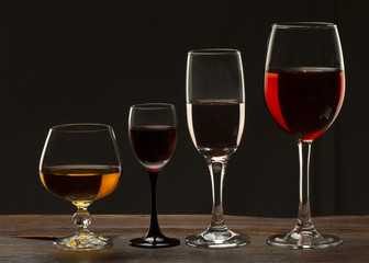 Glass still life image A glass of red wine in a glass on a black background