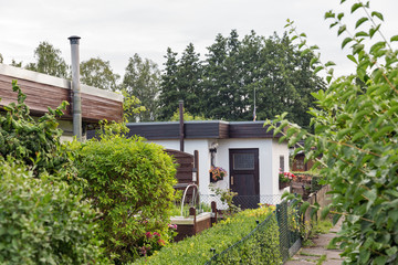 garden houses on private plots in a suburb of a big city