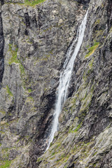 waterfall in rocky mountains, Norway.