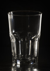 Empty glass on a black background close-up