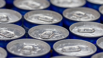 Pattern repeating of beer cans in alcohol and beverage department of superstore