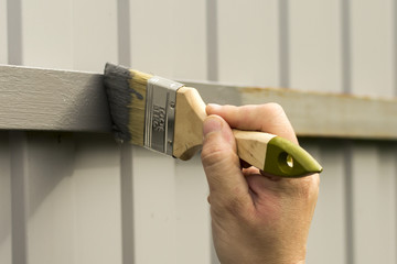 fence repair in paint and paint