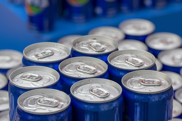 Pattern repeating of beer cans in alcohol and beverage department of superstore