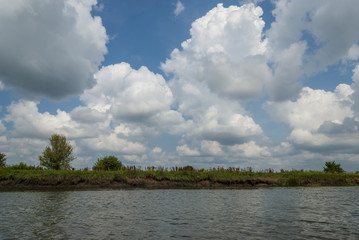 River with blue sky and clouds  in summer day