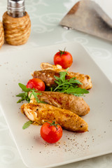 Chicken rolls with risotto stuffed with shrimps