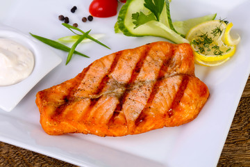 Grilled salmon with sauce