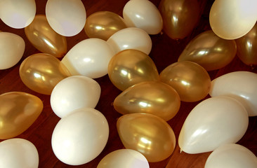 Gold and White Balloons