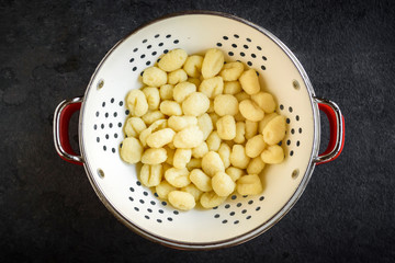 Prepared and cooked gnocchi,mushrooms and gnocchi dish,selective focus