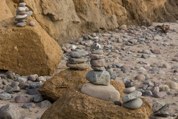 Balance stone with spa on the river or coast