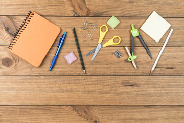 School supplies on some wooden boards