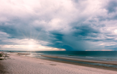 Cloudy sky in the morning ocean before storm