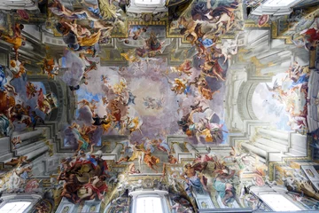 Deurstickers Paintings and frescos on the ceiling of a catholic Church of St. Ignatius of Loyola at Campus Martius, in Rome, Italy © Richard McGuirk
