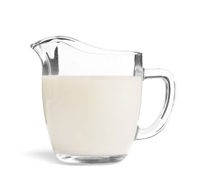 Glass jug with fresh hemp milk on white background