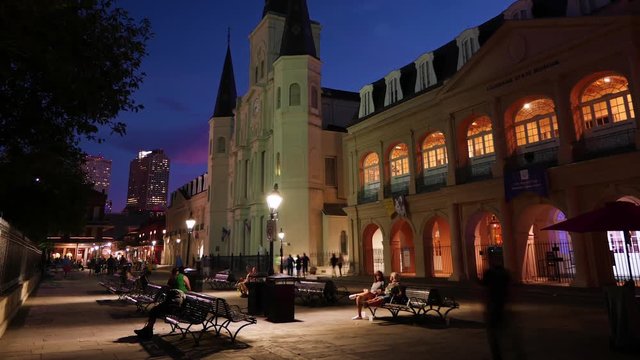 Time-lapse shot of the famous Saint Louis Cathedral in Jackson Square New Orleans as the sun sets.