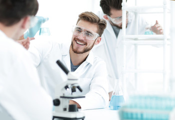 closeup.smiling team of biologists in the lab