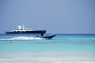 Fototapeta na wymiar Yachts buoyant or suspended in the Andaman Sea.